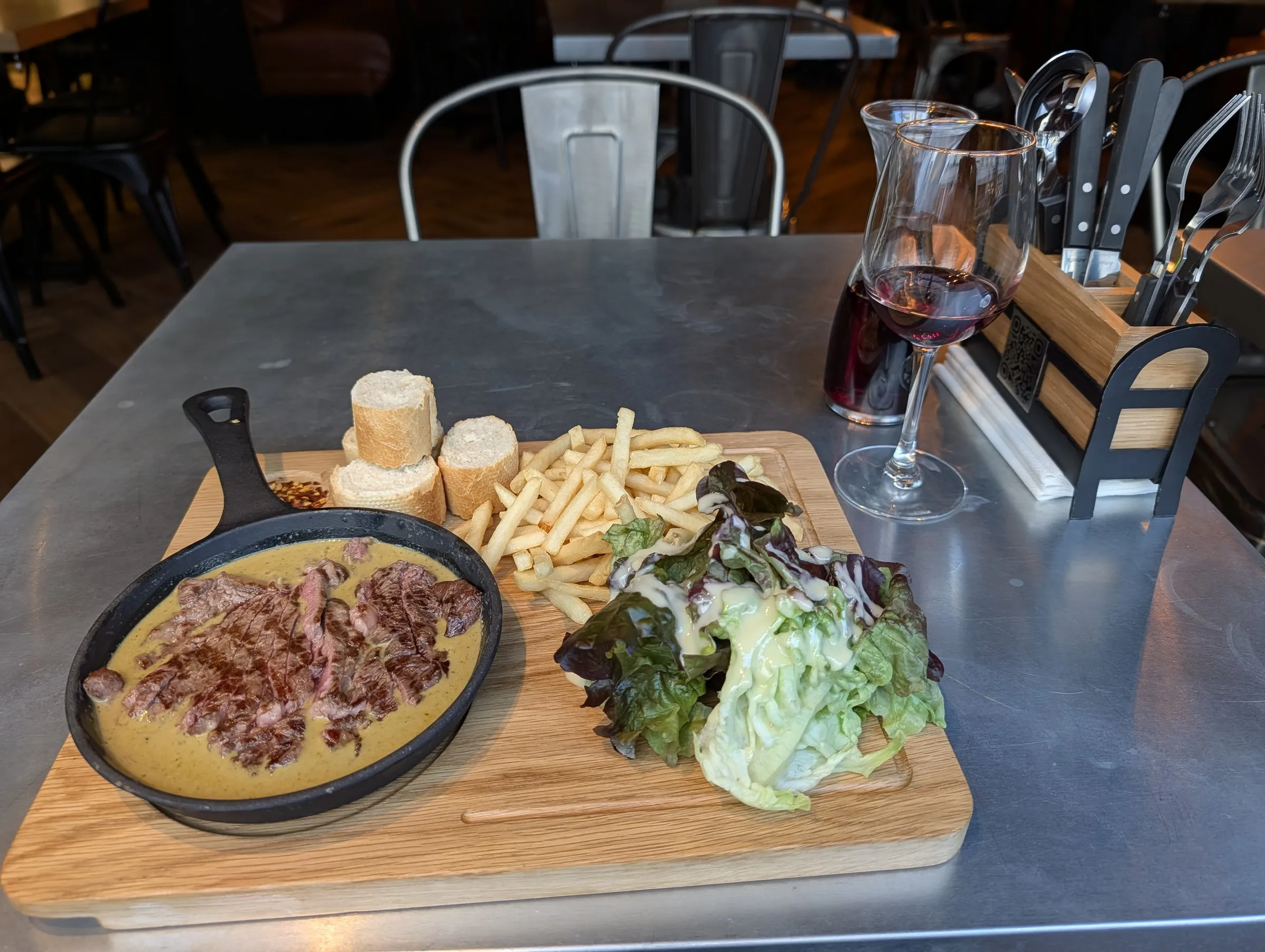 Steak in butter sauce with fries and salad on Faubourg Montmartre, at the Swiss Butter soft launch (comped)