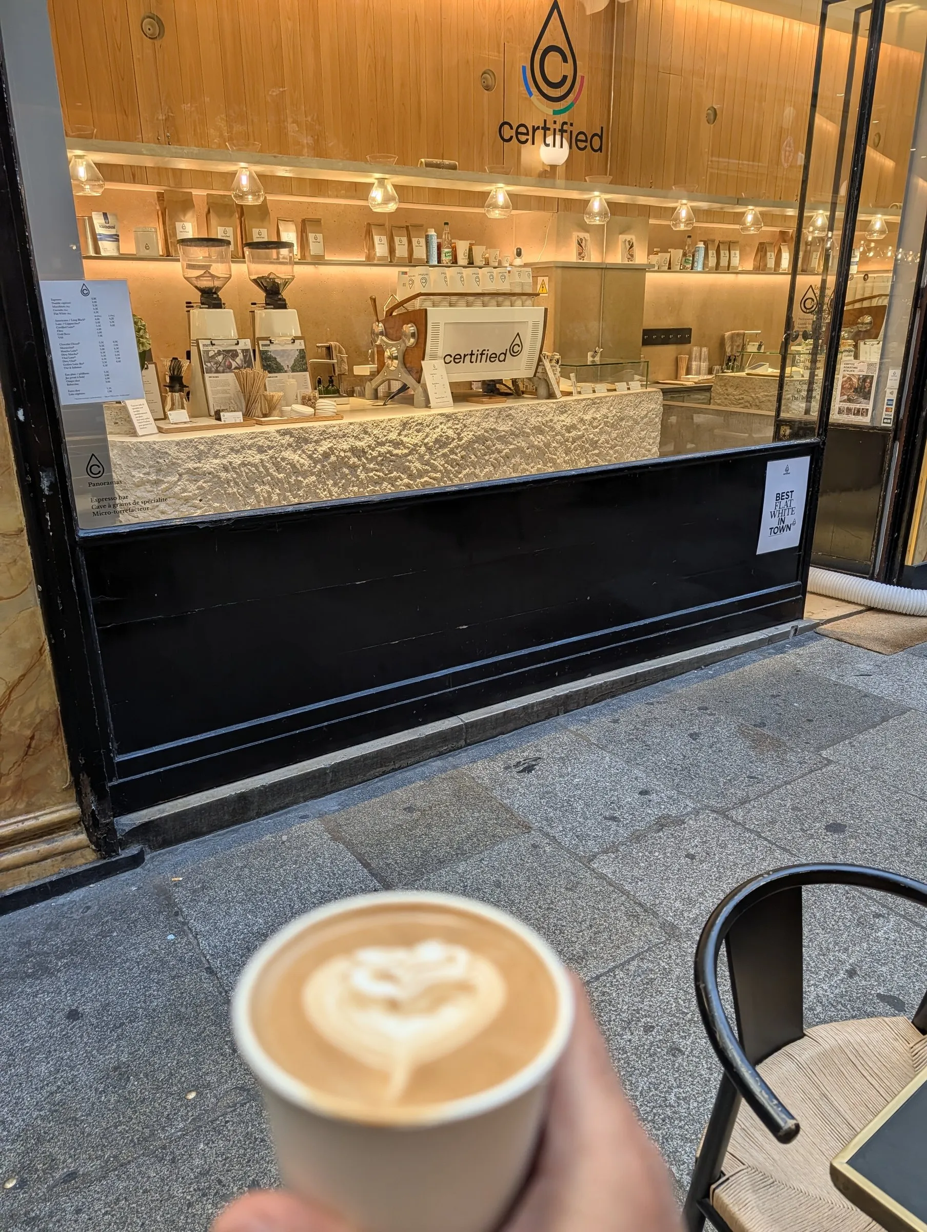 Morning flat white on the sidewalk
