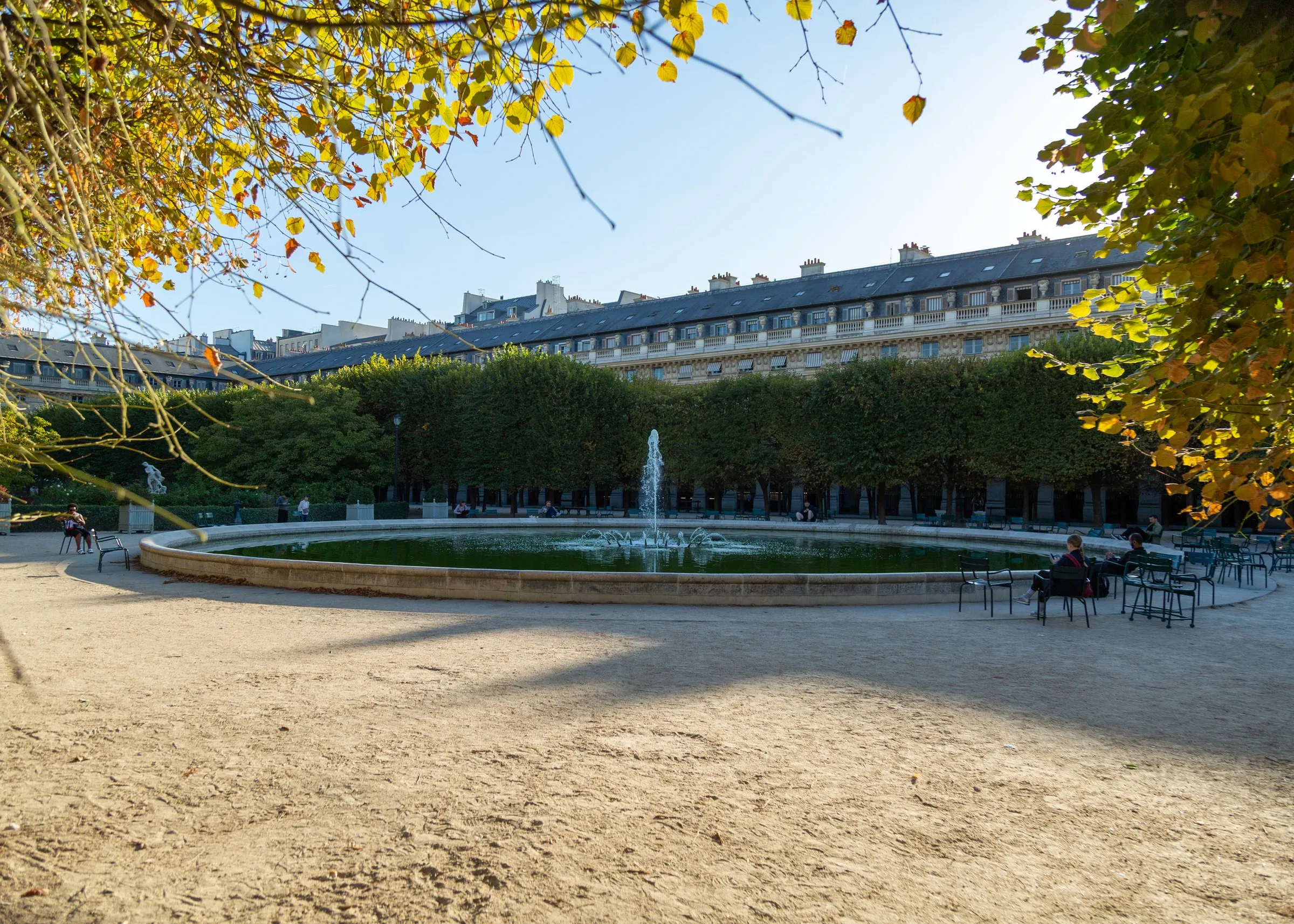 The Palais-Royal garden and fountain in morning sun