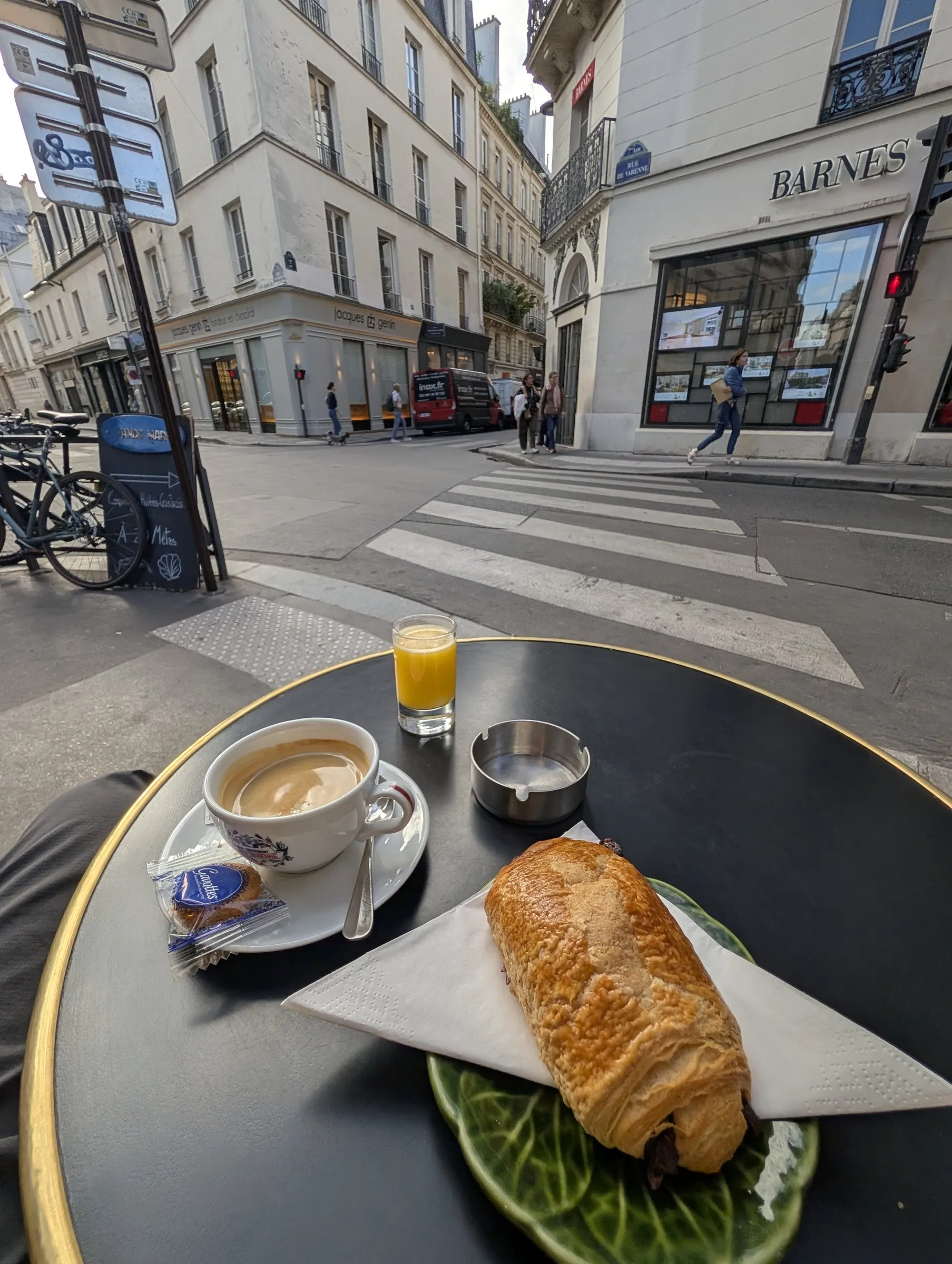 Café crème, orange juice and a pain au chocolat on the Left Bank