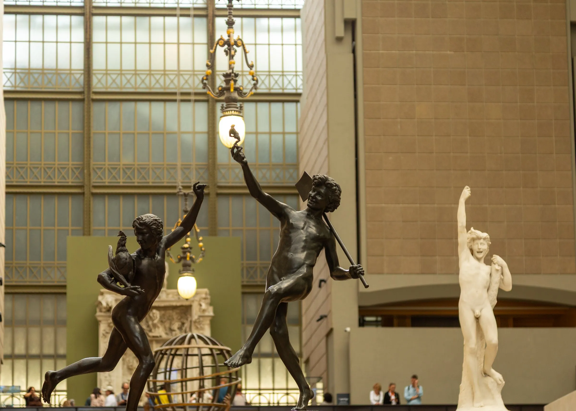 Bronze figures in the central aisle at Orsay