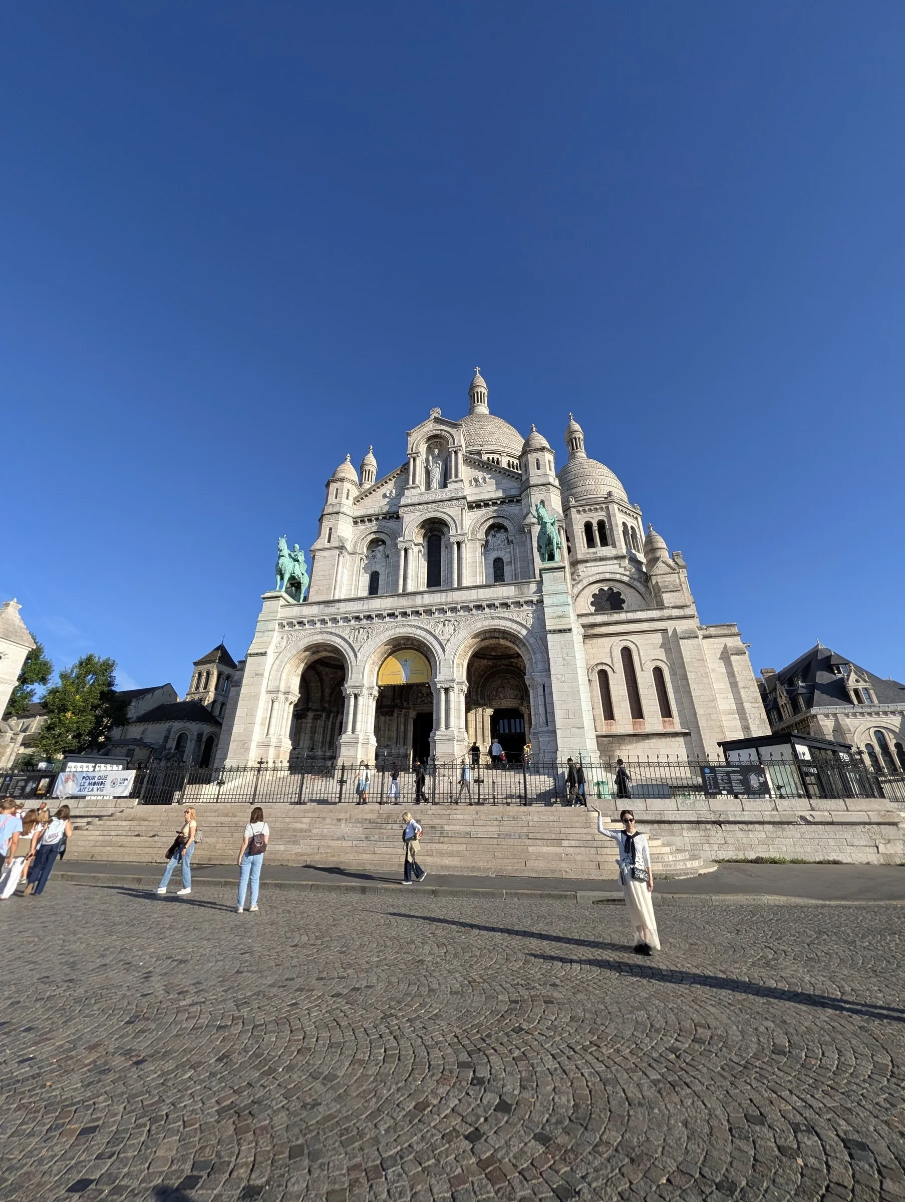 Sacré-Cœur against a hard-blue sky