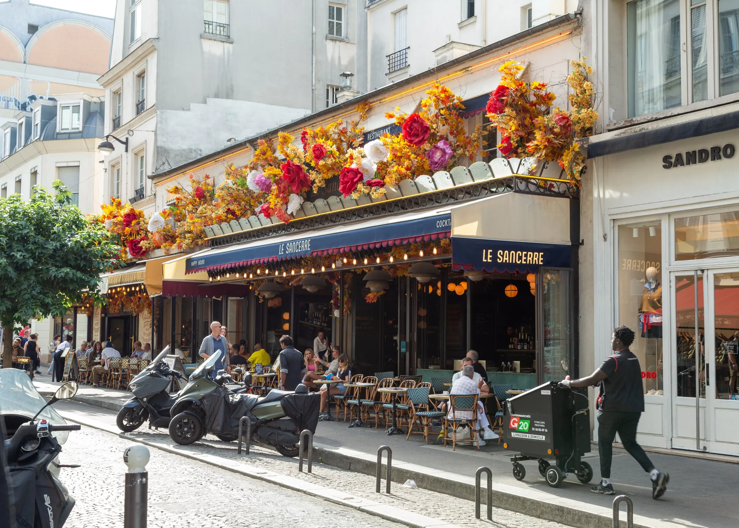 Le Sancerre's flower-covered awning in Montmartre