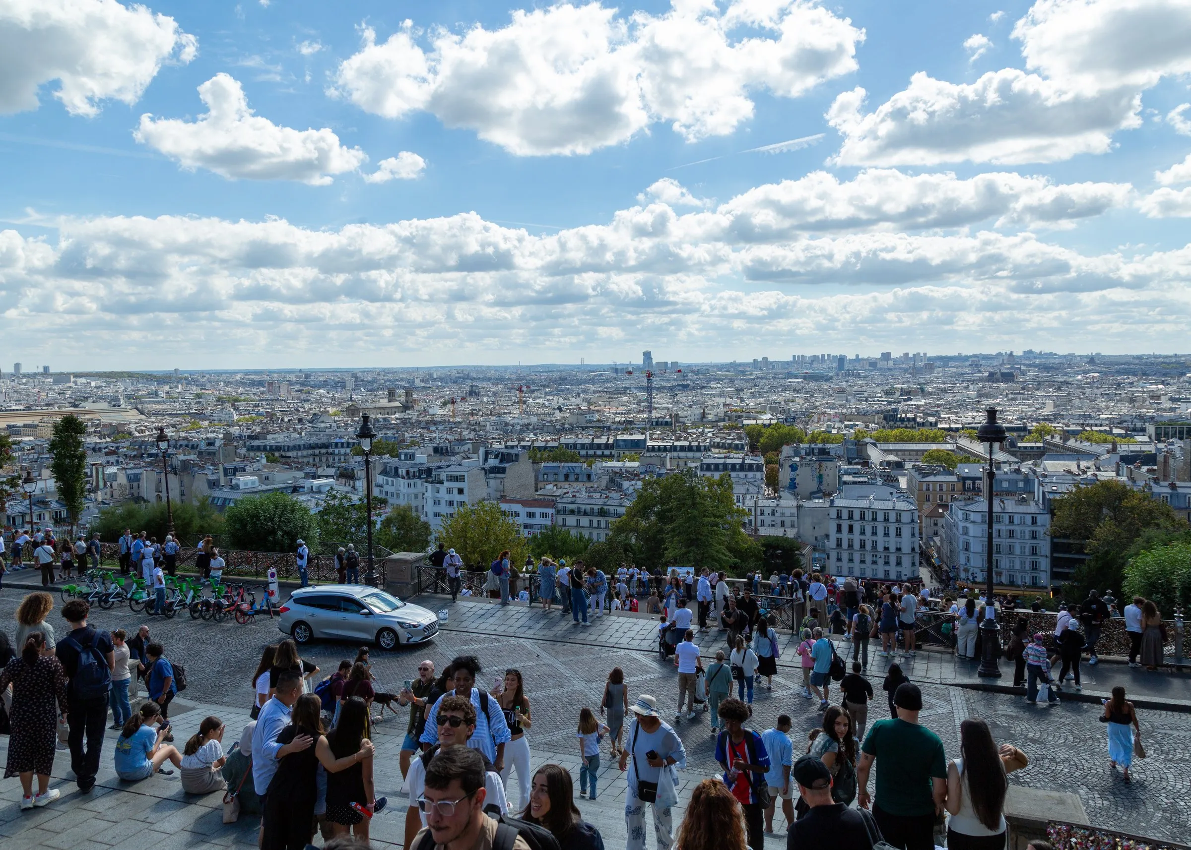 The view and the crowds from the Sacré-Cœur steps