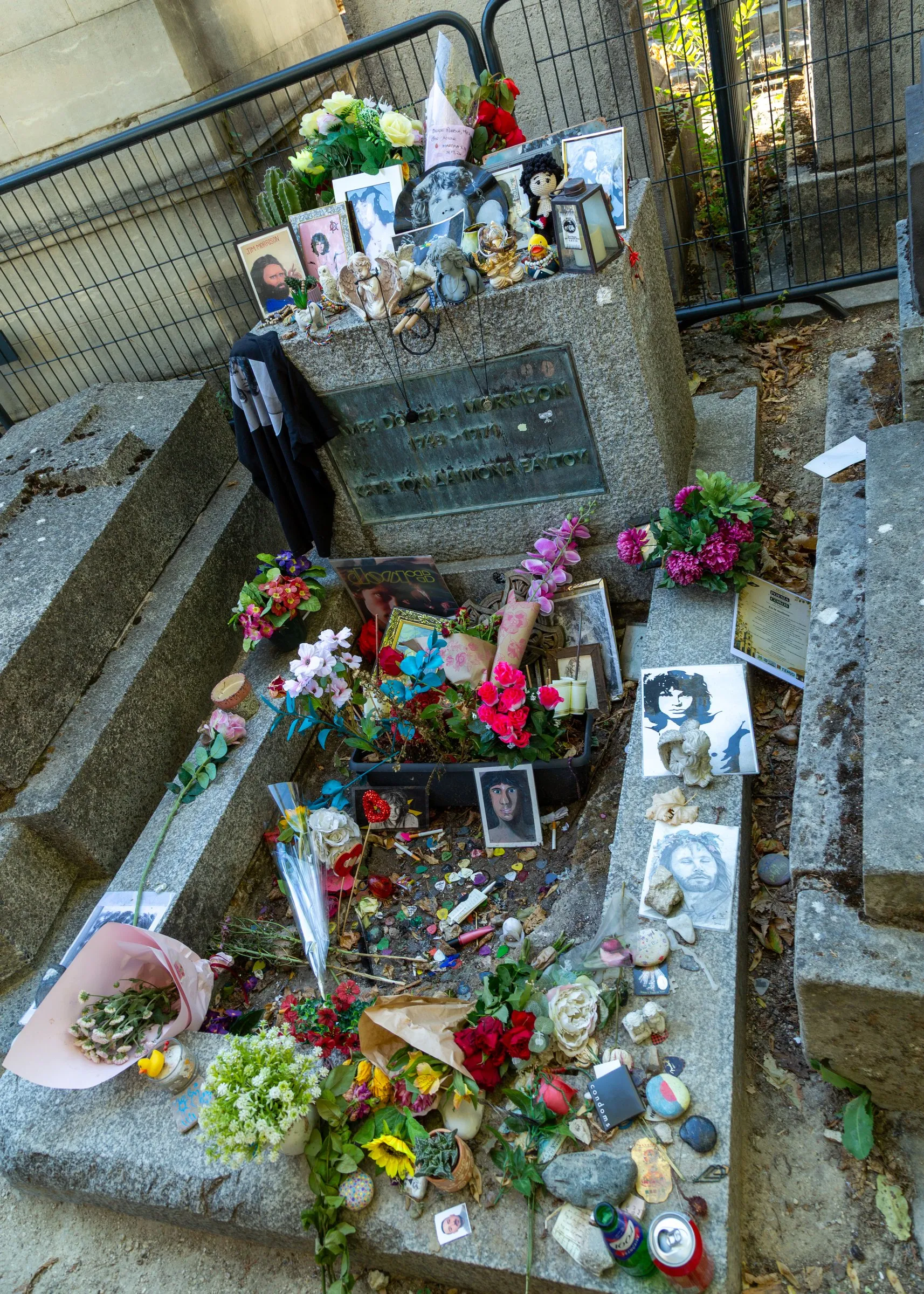 Jim Morrison's grave behind its barrier