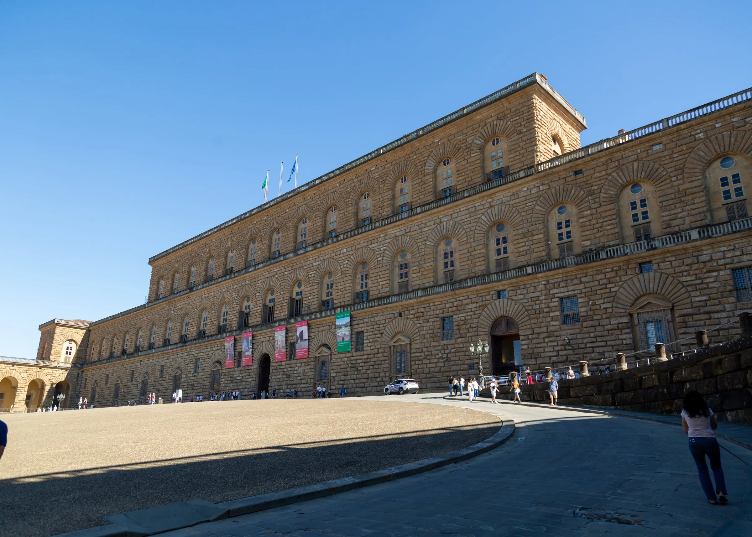 Palazzo Pitti across its sloping piazza