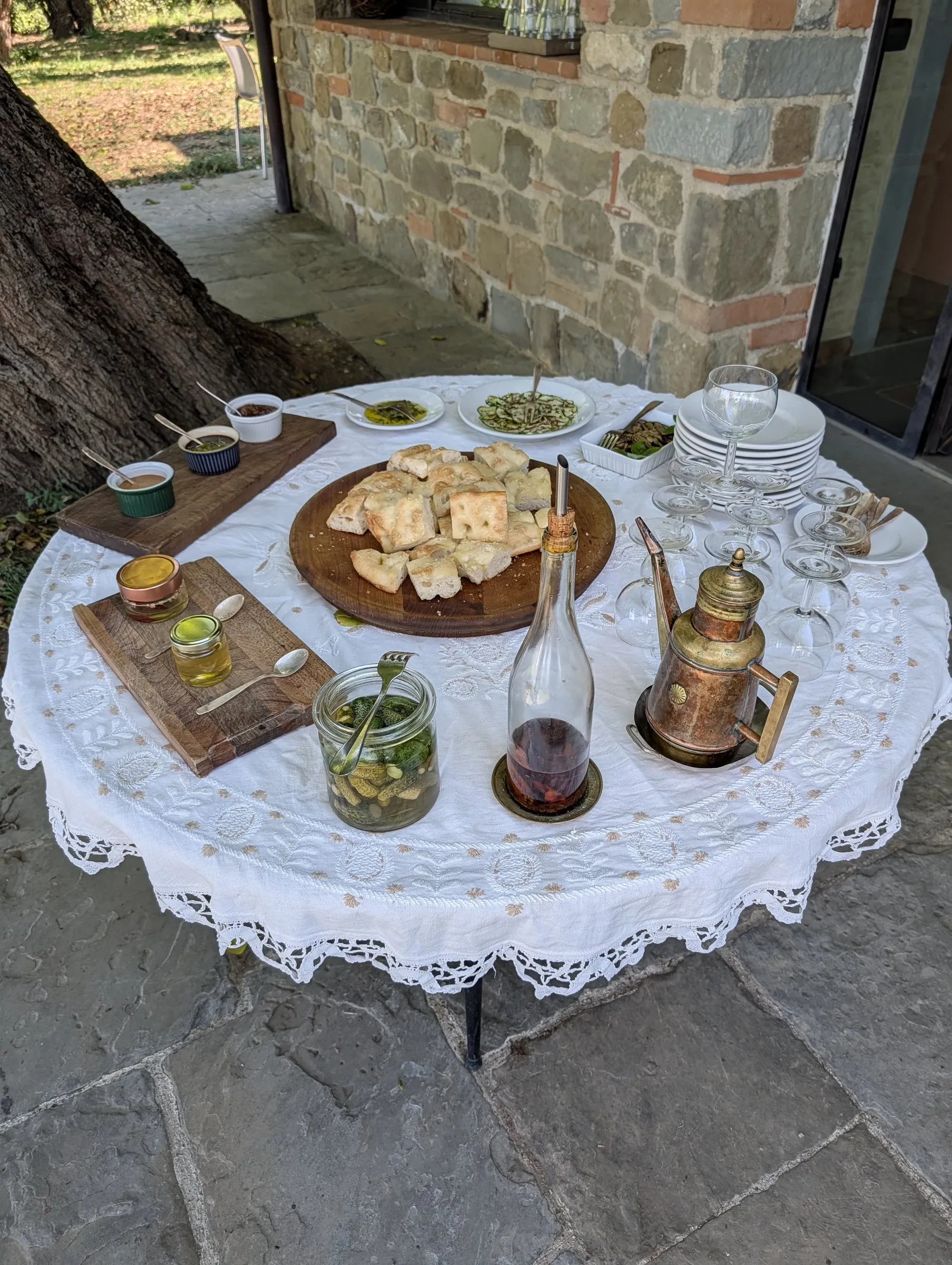 The farm's own olive oil, bread and wine set out on arrival