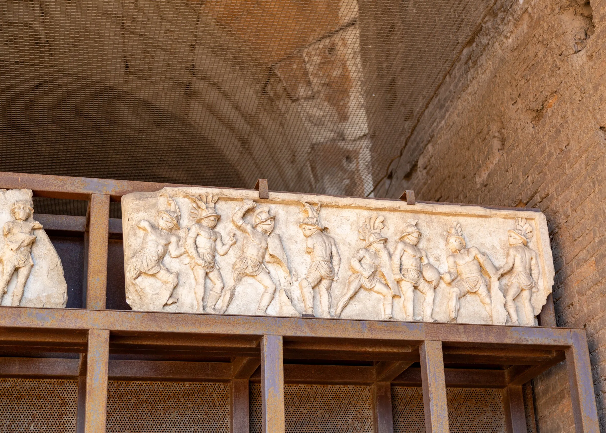 A carved relief displayed in the Colosseum's corridors