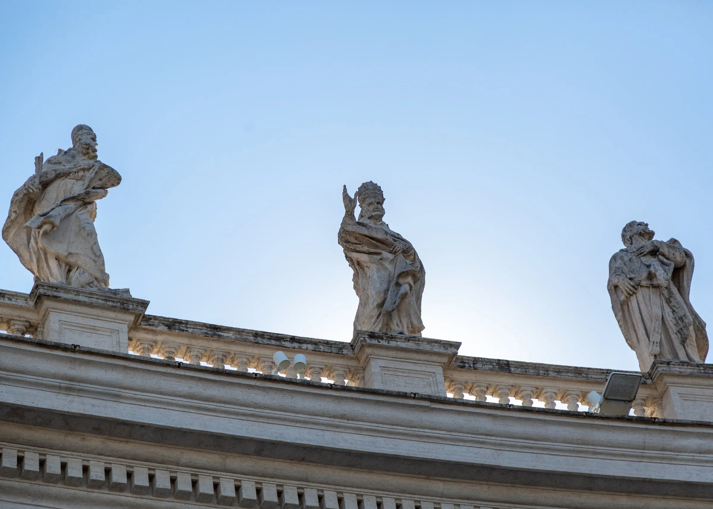 Statues along the top of the colonnade