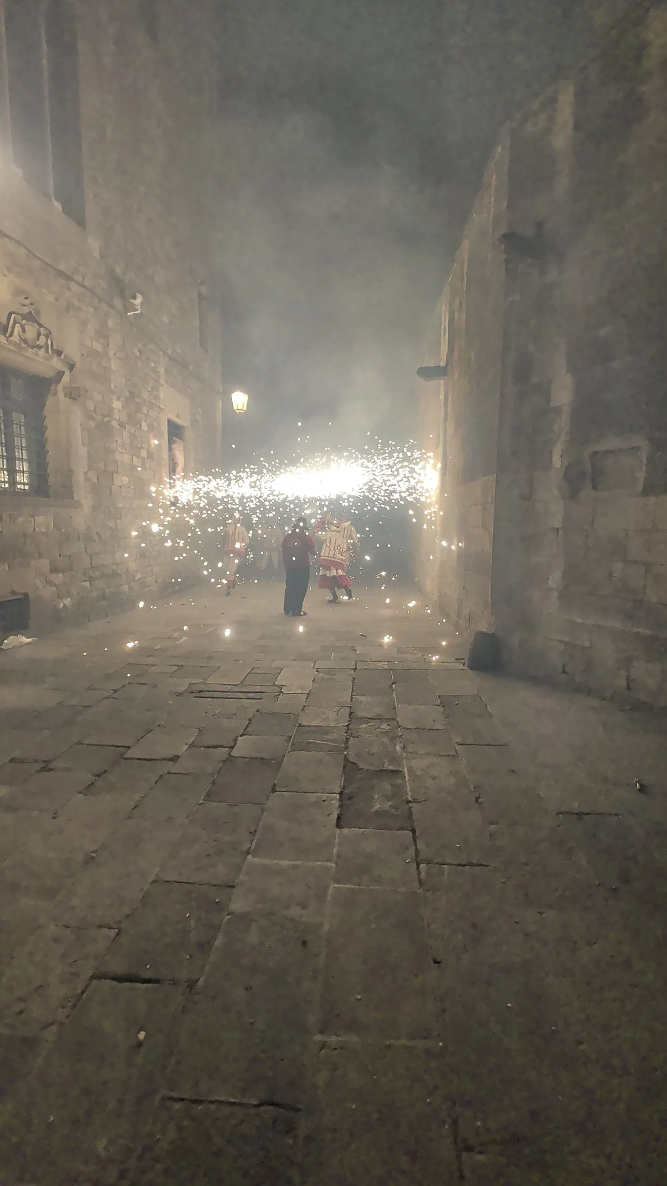 Sparks filling a narrow street