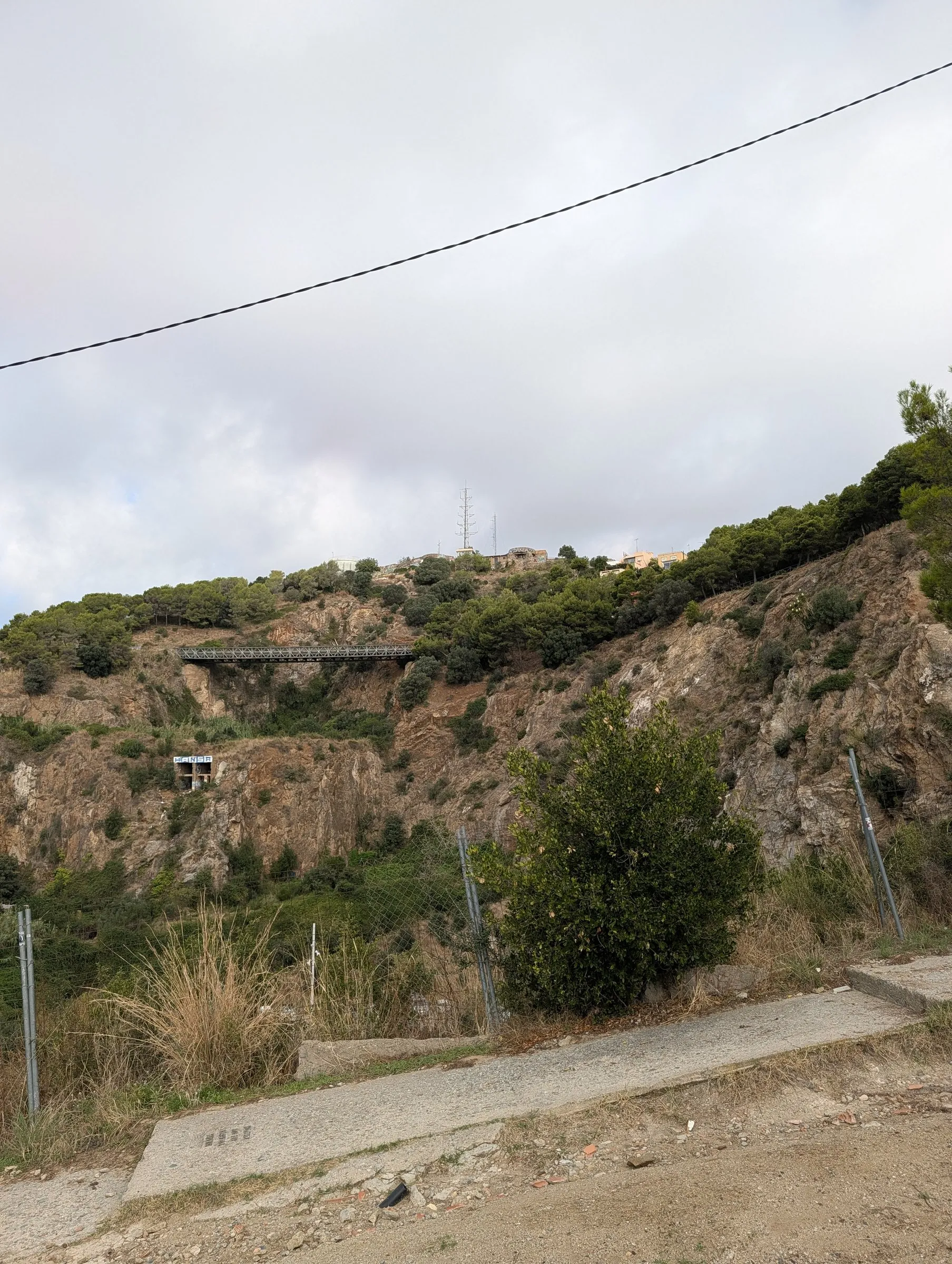 Heading back down past the quarry cliffs