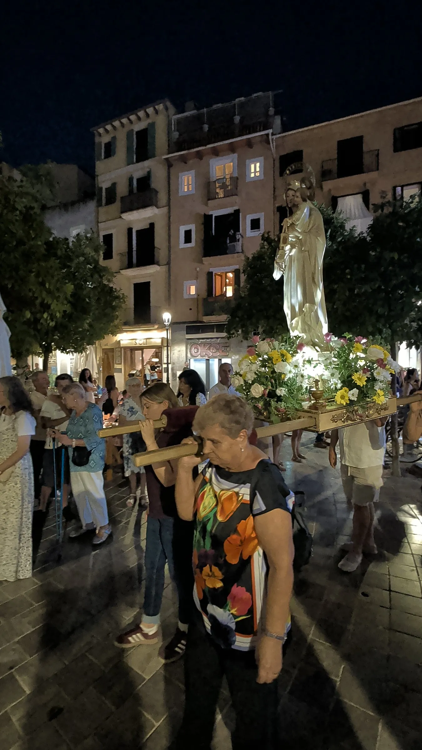 The procession: a statue carried through the old town