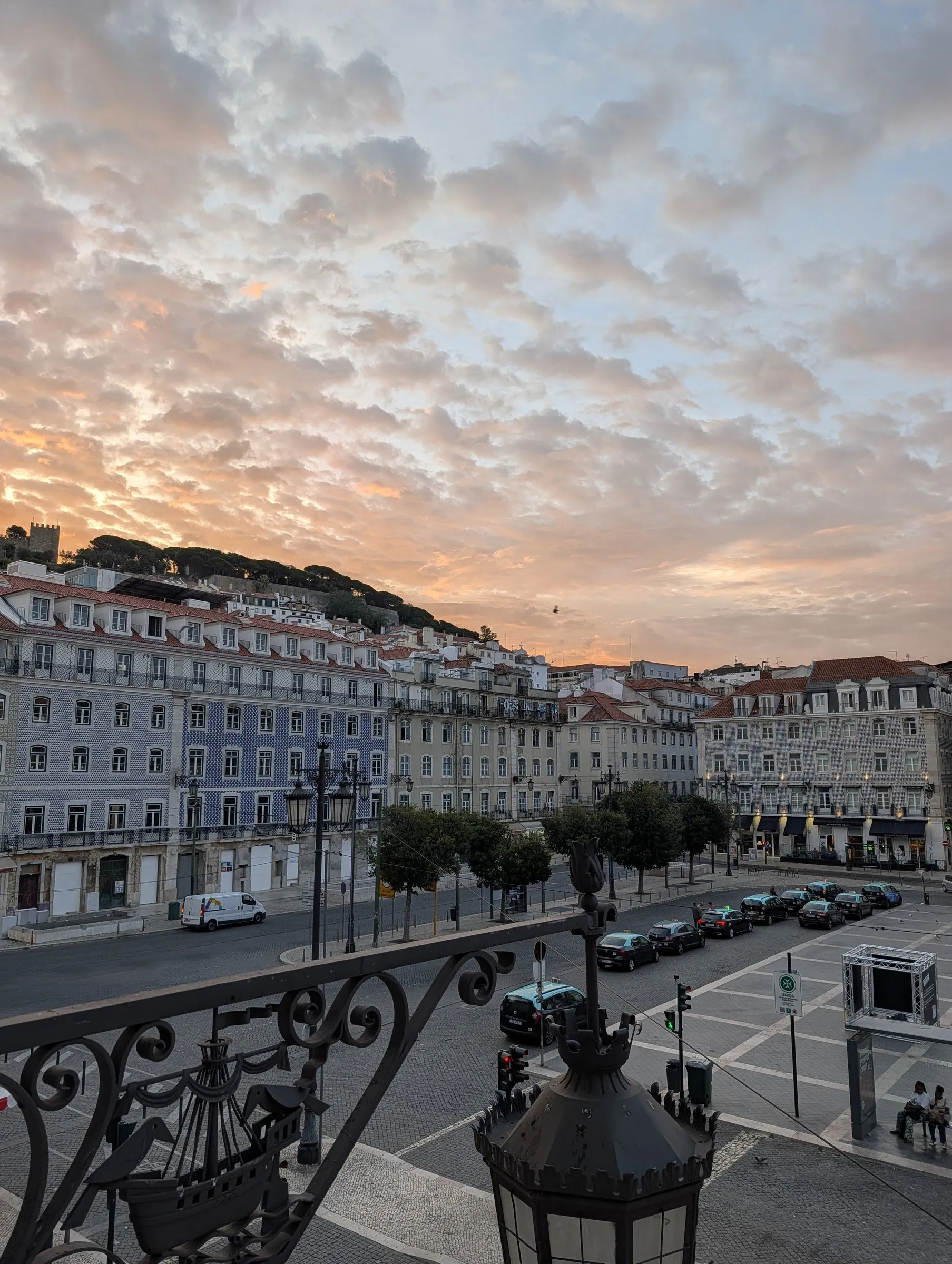 Sunrise over Praça da Figueira from the window