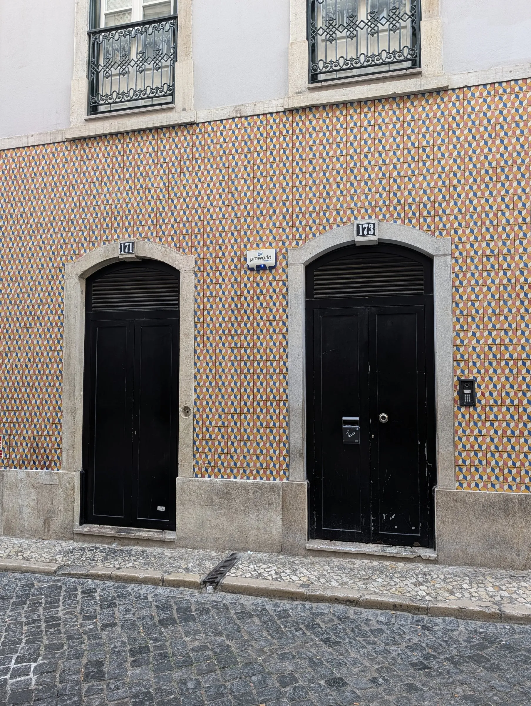Tiled façade and twin doors