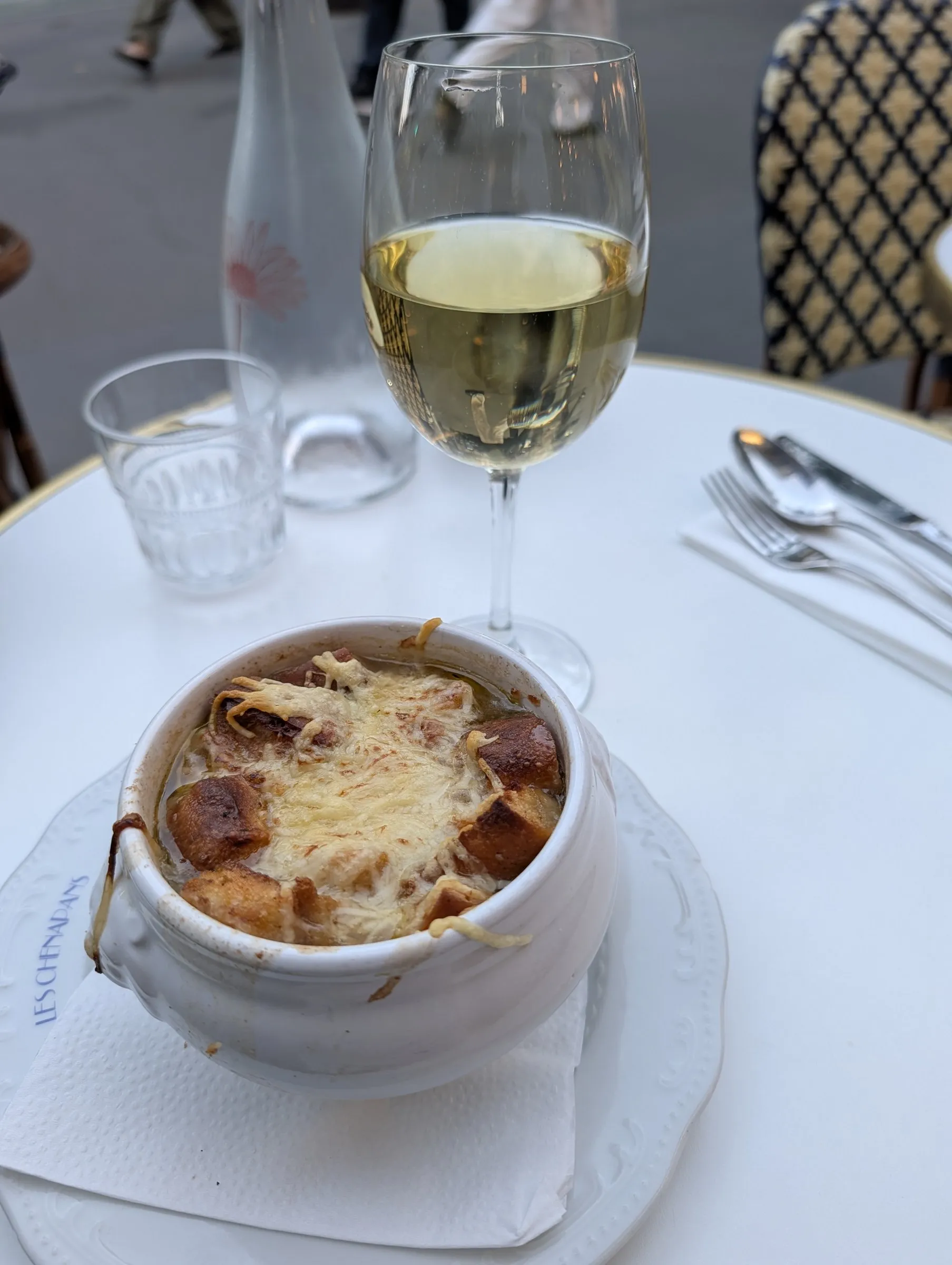 Onion soup and a glass of white near the Gare du Nord